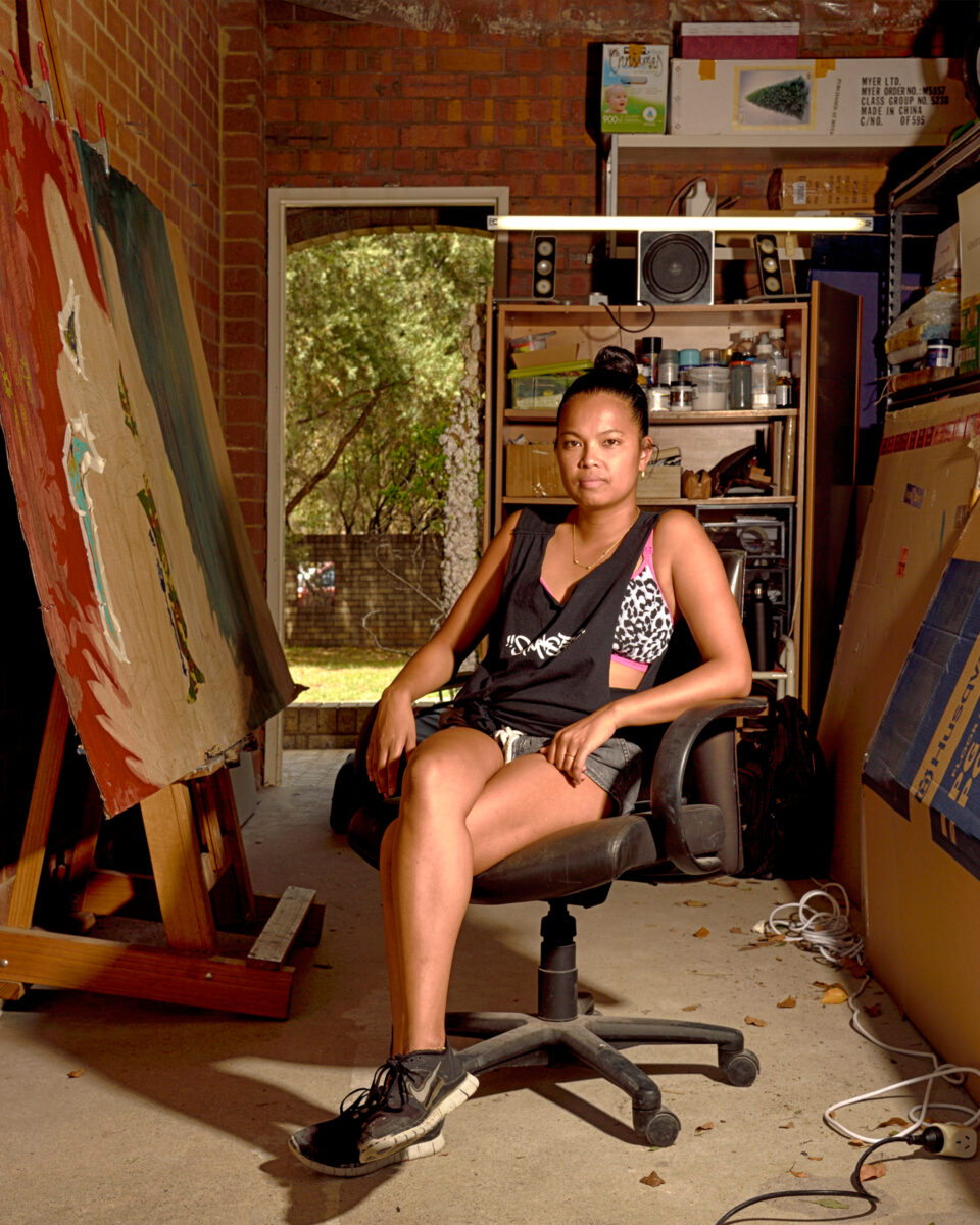 Marikit Santiago sitting in her studio