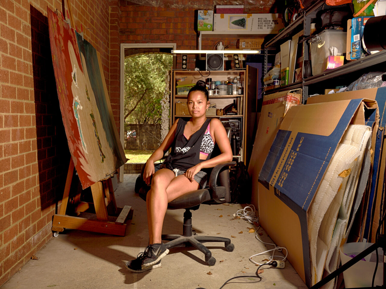 Marikit Santiago sitting in her studio