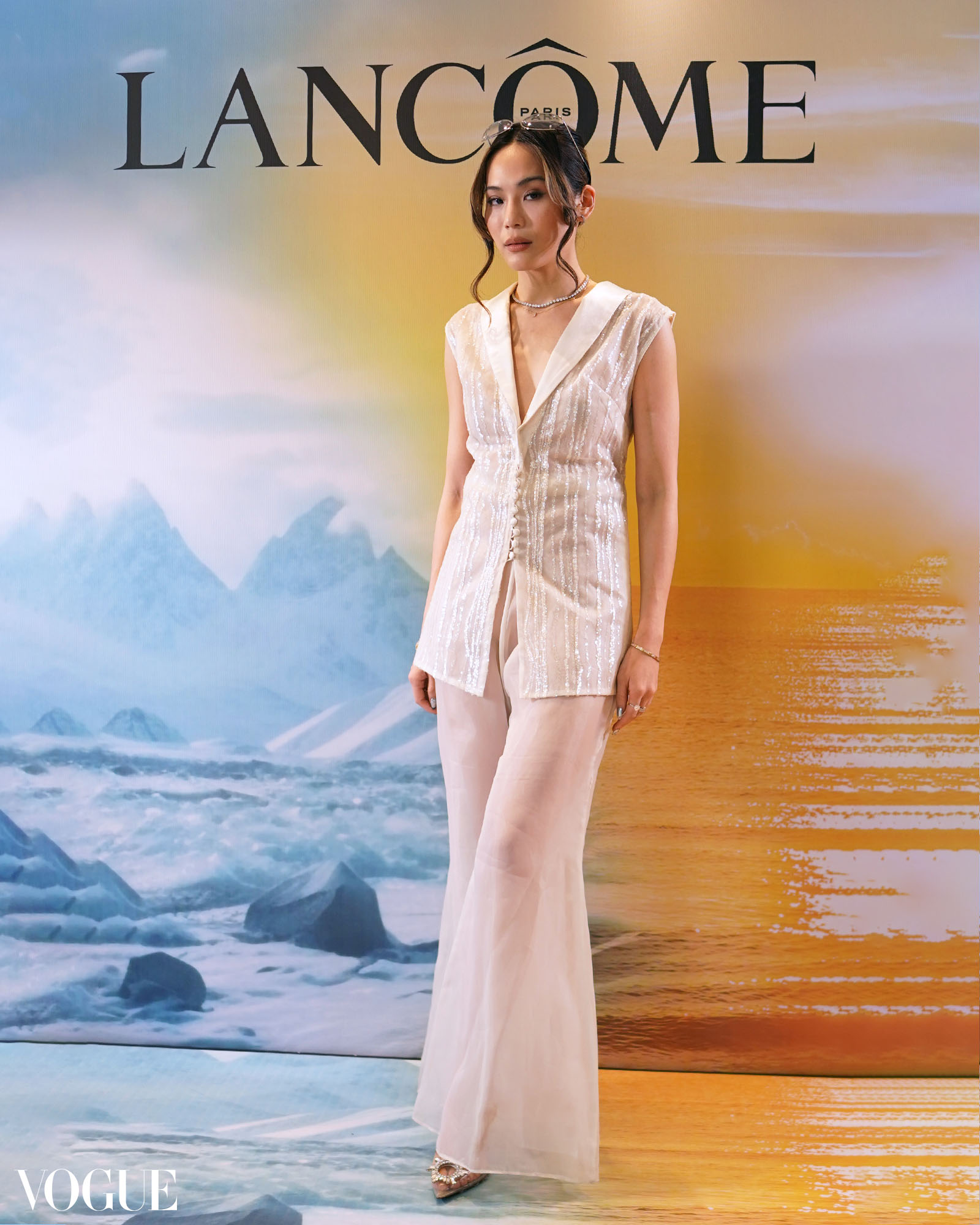 Jaz Reyes wearing a sparkly vest top and piña pants attends the Lancôme launch in the Philippines