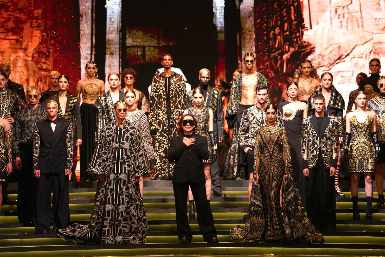 Michael Cinco with models at a Michael Cinco Show