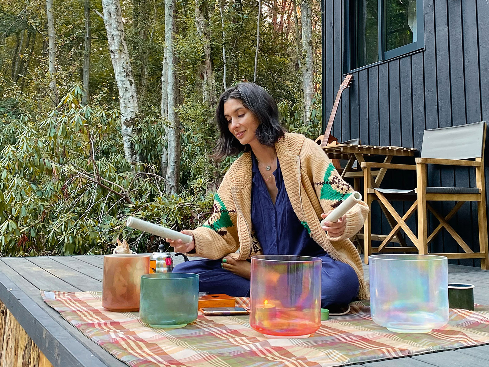 Jasmine Hemsley sitting down with glass objects in front of her