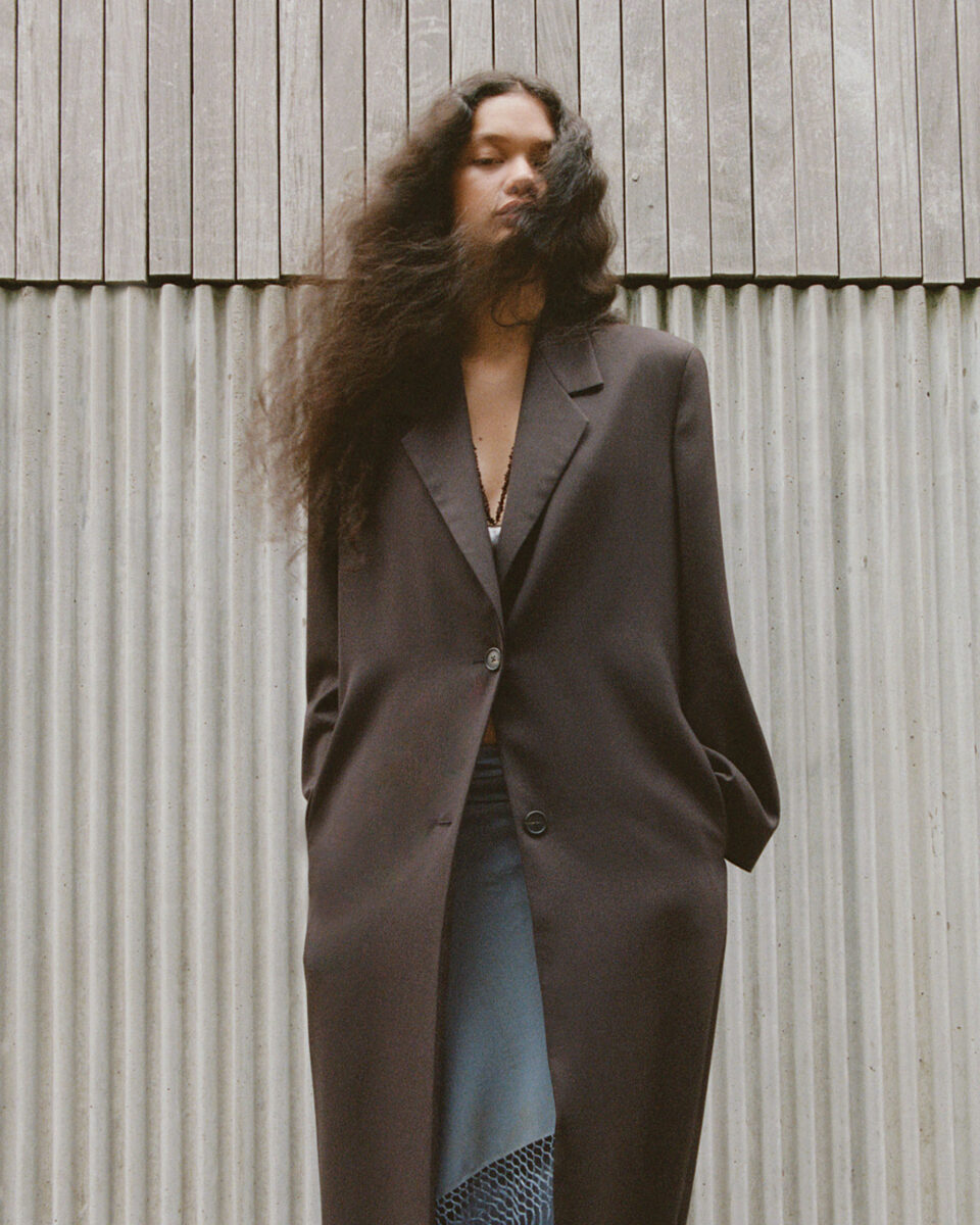Maddux Callaway wearing a trench coat, photographed by Sophia Aerts.